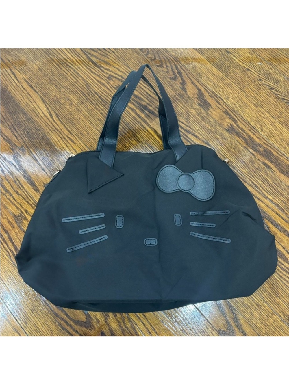 Hello Kitty Black Travel Tote Bag - Minimalist Embossed Design